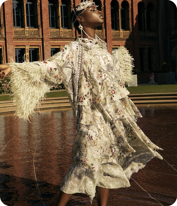 Fashion editorial portrait in a feathered dress