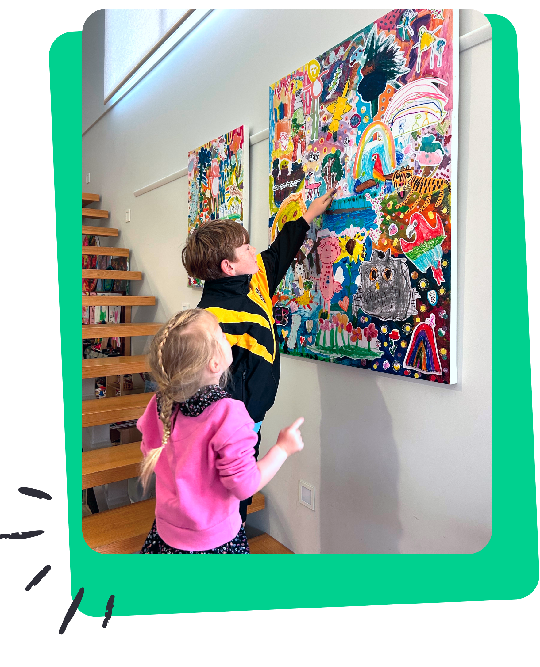 Children looking at their finished heirloom collage